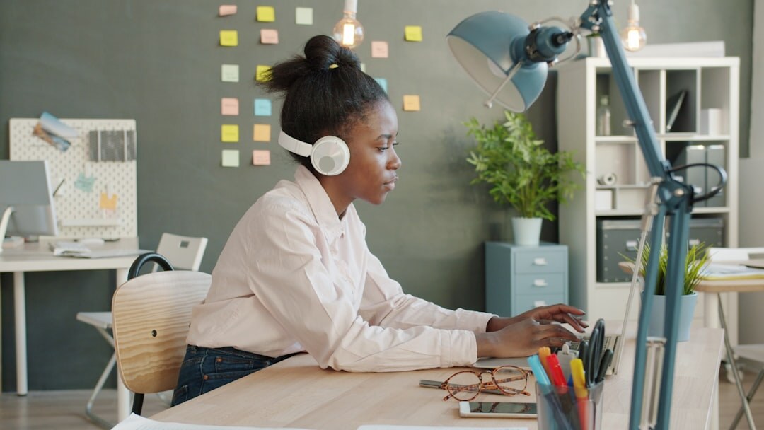 woman recording video at desk