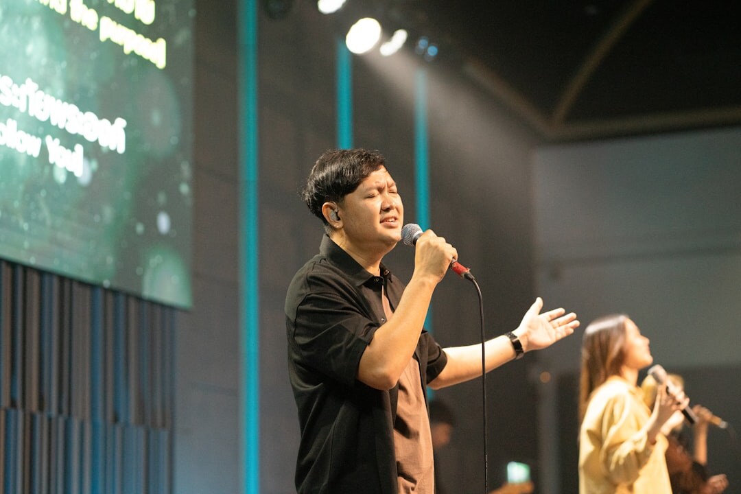 person speaking confidently on stage