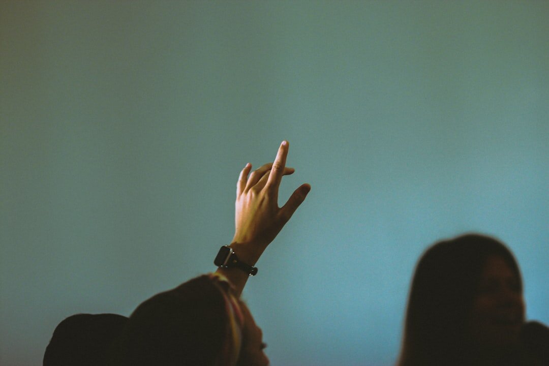 speaker using hand gestures on stage